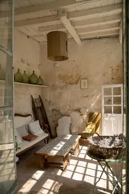 a living room with a couch and a table at Camellas-Lloret in Montréal