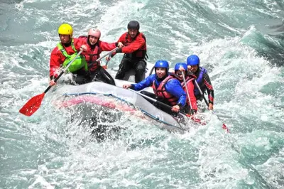a group of people in a raft in the water at Spacious stone village house in Puivert in Puivert