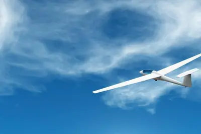 a white plane flying through a cloudy sky at Spacious stone village house in Puivert in Puivert