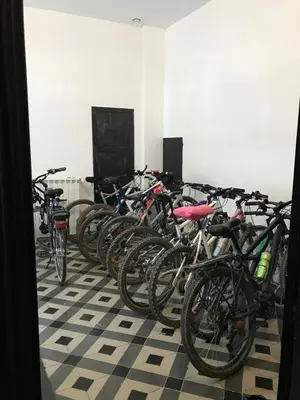 a row of bikes parked in a room at Le Voyageur - Chambres d'Hôtes in Olonzac