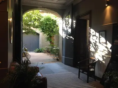 an entry way to a house with an open door at Le Voyageur - Chambres d'Hôtes in Olonzac