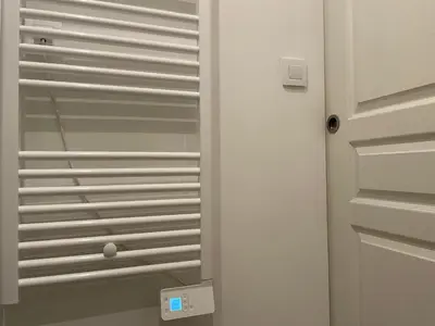 a white door with a door knob next to it at Studio Le Cilaos, au cœur de Castres in Castres
