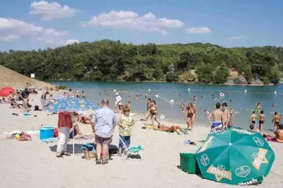 a group of people on the beach at a beach at Chez Gaëlle in Trèbes
