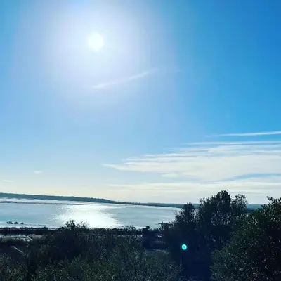 a view of a large body of water at Duplex proche mer, avec swimspa terrasse, jardin et barbecue in Lapalme