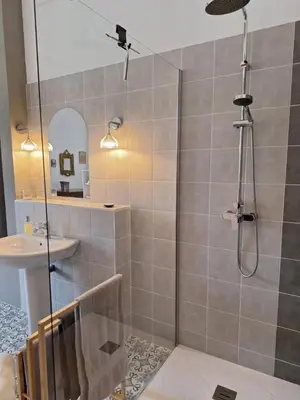 a bathroom with a shower and a sink at domaine de Capoulade in Narbonne