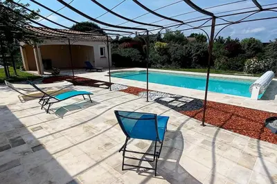 a patio with chairs and a swimming pool at Villa 140 m² hab. avec piscine in Castres