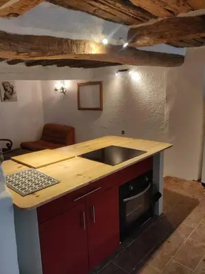 a kitchen with a sink and a counter top at VILLA VILATA A PADERN DANS LES CORBIÈRES SAUVAGES in Padern