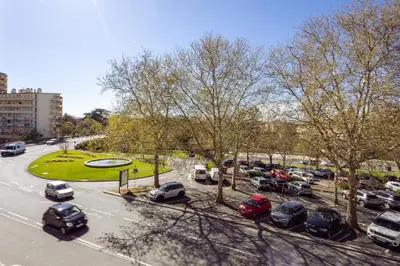 a view of a parking lot with cars parked at L'alouette - Studio Duplex Confort en Hypercentre in Castres