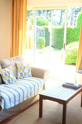 a living room with a couch and a coffee table at Gites de Labadie in Lautrec