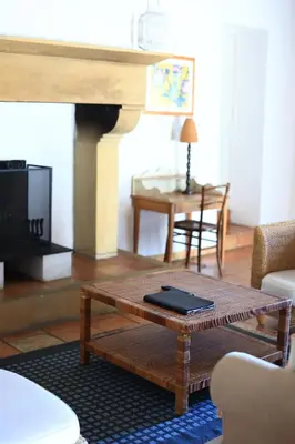 a living room with a coffee table and a couch at Gites de Labadie in Lautrec