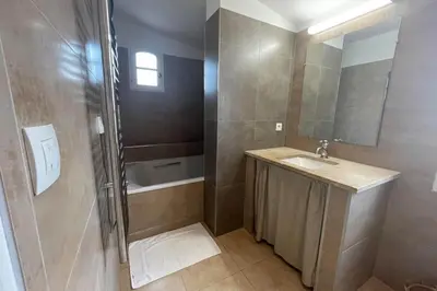 a bathroom with a sink and a shower at Maison au cœur des Corbières in Saint-Laurent-de-la-Cabrerisse