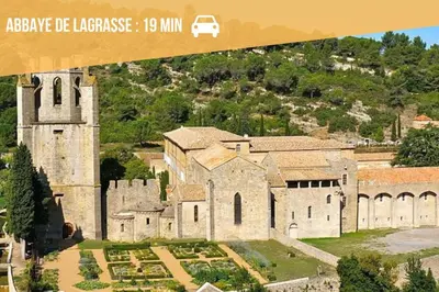 an image of an old castle with a van at Maison au cœur des Corbières in Saint-Laurent-de-la-Cabrerisse