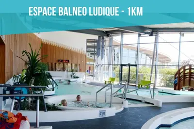a person in a bath tub in a swimming pool at L'Escale de la Plage in Gruissan