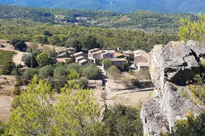 a view of a village from a mountain at LA PASTOURELLE in Saint-Chinian