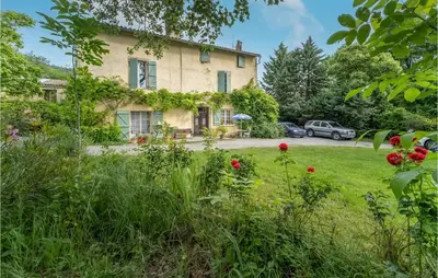 a house with a garden in front of it at Nice Home In Chalabre With Wifi in Chalabre