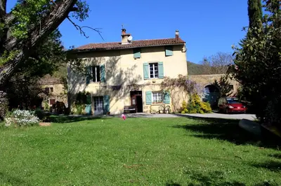 a large house with a yard in front of it at Domaine du Bourdil au pays Cathare in Chalabre
