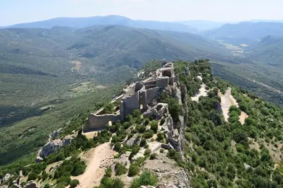 an aerial view of a castle on a mountain at Comme à la Maison - Accueil tout Public - Groupes - Rando - Vélos - Motos in Saint-Paul-de-Fenouillet