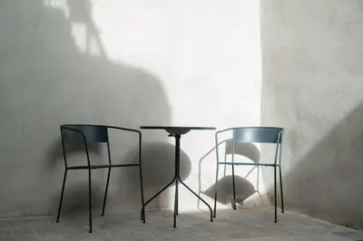 two chairs and a table in a room at Bouquerie Lagrasse in Lagrasse