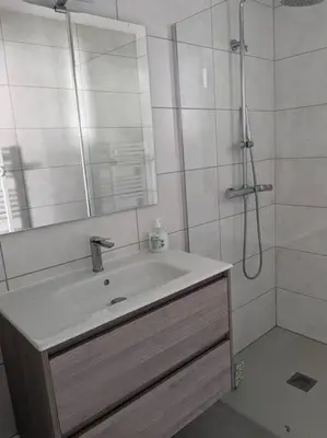 a bathroom with a sink and a shower at Petite Bulle in Narbonne