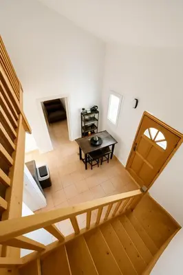 an overhead view of a room with a table at Appartement près du canal du midi in Mirepeisset