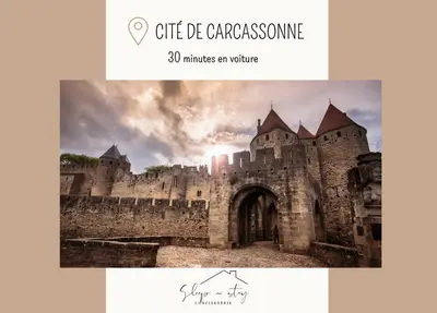 a picture of a castle with the words minutes an online at Le Canal - Appartement avec vue 4 personnes in La Redorte