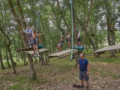 a group of people playing on a swing at Scenic Retreat w Terrace in Quillan