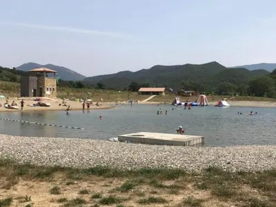 a group of people in the water at a beach at Peaceful Pyrenees Retreat in Quillan