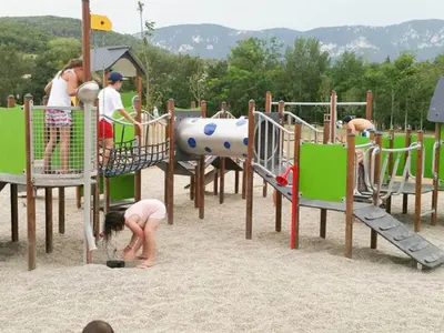 a group of children playing on a playground at Pet-Friendly Home w Garden in Quillan
