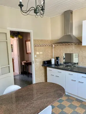 a kitchen with a stove and a counter top at Danoss Cool Stay in Narbonne