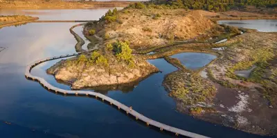 an aerial view of an island in the water at Villa Terracotta - 8 Personnes - Proche de la mer in Peyriac-de-Mer