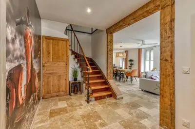 a hallway with a staircase in a house at Villa Terracotta - 8 Personnes - Proche de la mer in Peyriac-de-Mer