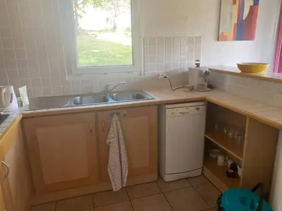 a kitchen with a sink and a dishwasher at Charming house in Espinet domain in Quillan