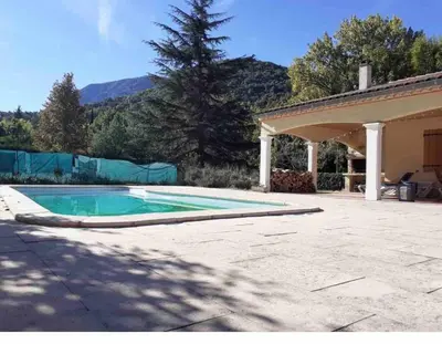 a swimming pool in the backyard of a house at Quillan Villa with Pool in Quillan
