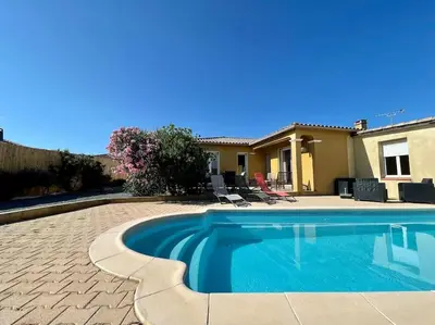 a swimming pool in front of a house at Villa La Paz ※ Climatisée in Lézignan-Corbières