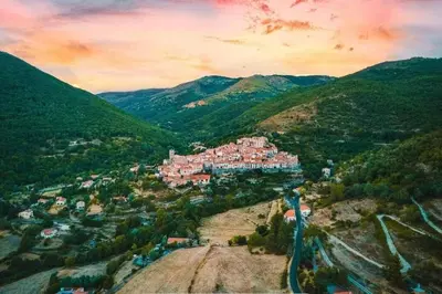 an aerial view of a town in the mountains at Casa del Sola in Mosset