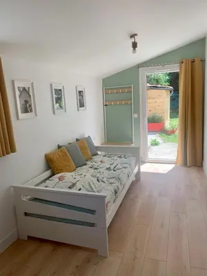 a bedroom with a bed in a room at Gîte de France Chez Fati in Les Brunels