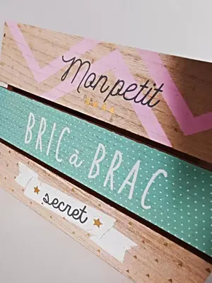 two wood signs with the words marilyn bite a brader and regret at Les remparts de Caroline, au pied de La Cité. in Carcassonne