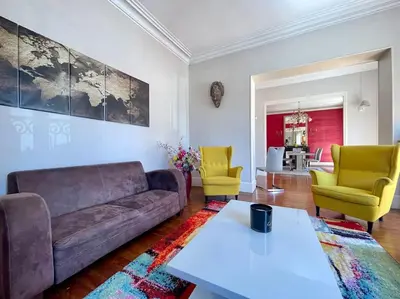 a living room with a couch and two chairs at Le Balcon de Gambetta ※ in Carcassonne
