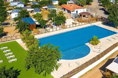 an overhead view of a large swimming pool in a resort at Anthony MH 140 in Port-la-Nouvelle