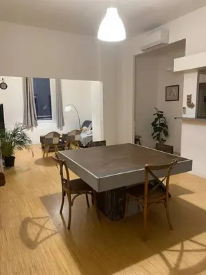 a large ping pong table in a living room at Appartement Morgand in Narbonne