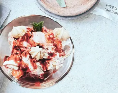 a glass bowl of food on a table at LE DINANGA in Léran