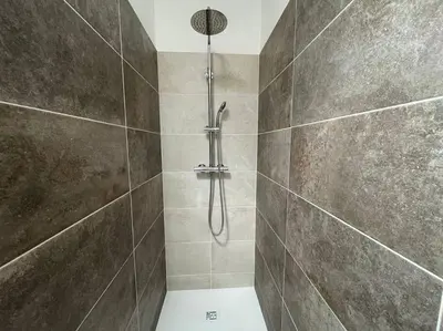 a bathroom with a shower with a toilet in it at Tierra Del Viento - Villa Proche de la Mer in Peyriac-de-Mer