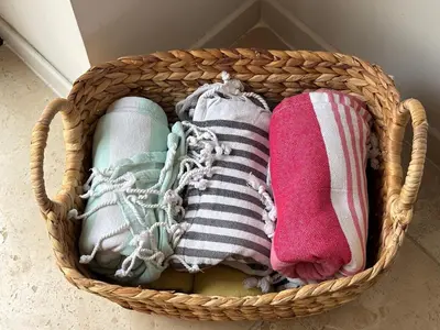 a basket filled with different colored socks at Hidden Oasis - Maison de caractère avec piscine in Azille