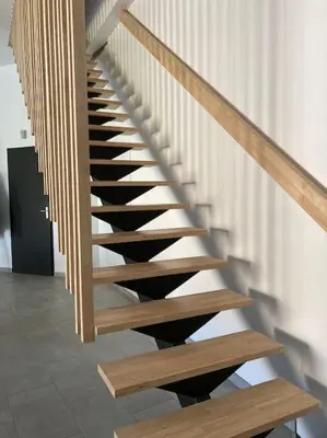 a staircase with wooden treads and a wooden bench at Piscine privée sans vis à vis / Calme / Babyfoot in Conques-sur-Orbiel