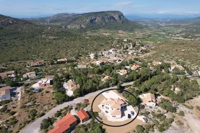 an aerial view of a house in the mountains at Trois appartements au sein du Mas Jams - Le Gouleyrous, Le Canigou et Le Figarassa in Vingrau
