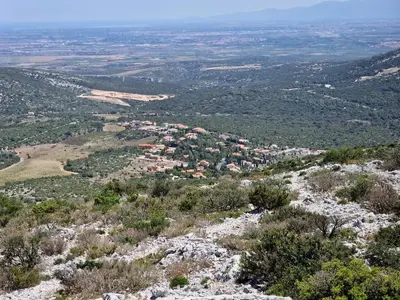 a view of a city from the top of a mountain at Trois appartements au sein du Mas Jams - Le Gouleyrous, Le Canigou et Le Figarassa in Vingrau
