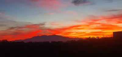 a sunset with a mountain in the background at Trois appartements au sein du Mas Jams - Le Gouleyrous, Le Canigou et Le Figarassa in Vingrau
