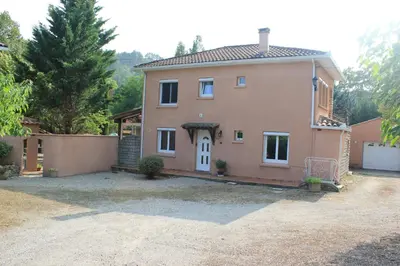 a large house with a driveway in front of it at Ty Calon Lan in Montazels