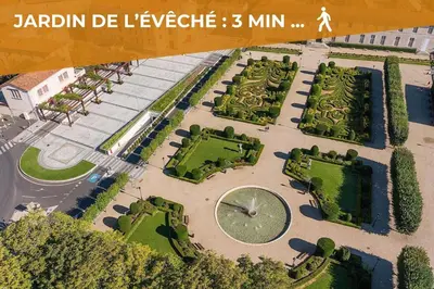 an overhead view of a park with trees and bushes at L'Évêché - T3 Spacieux & Traversant en Hypercentre in Castres