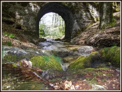 a painting of a stone bridge over a stream at Gite été in Le Soulié